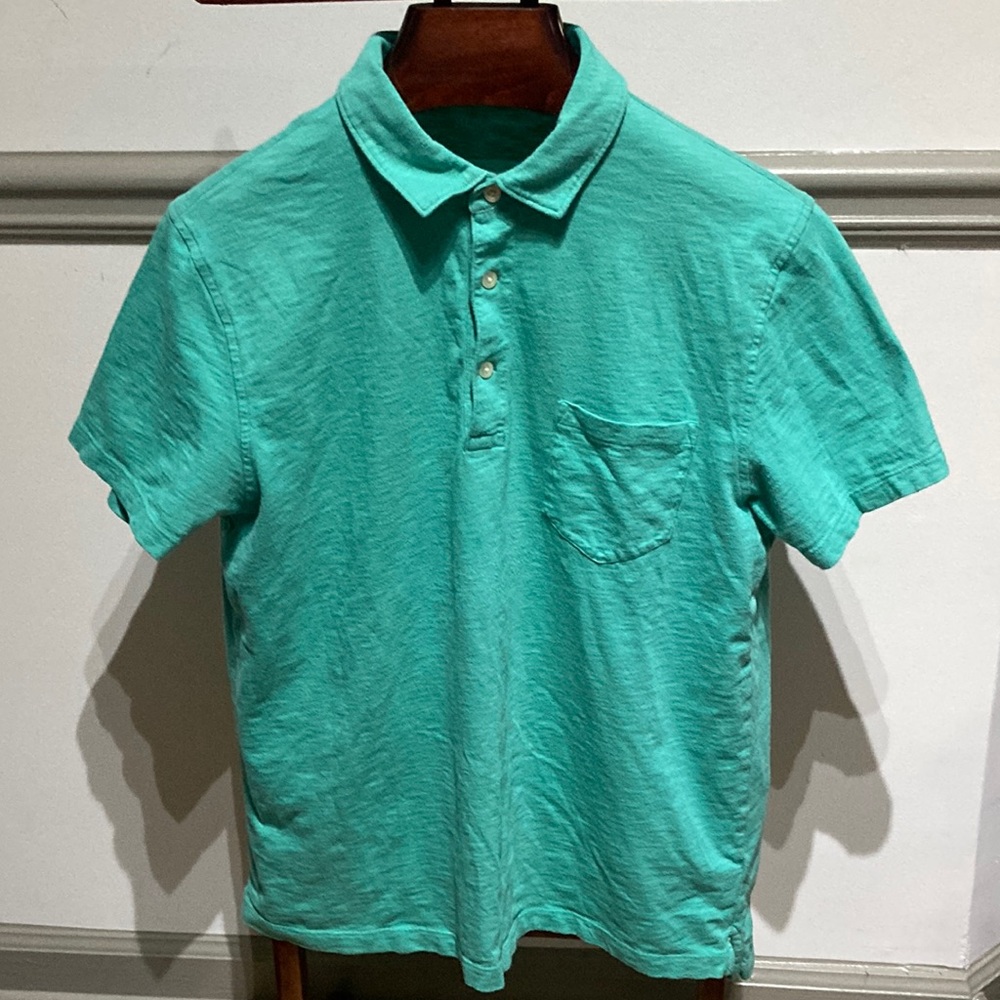 Men’s light green extra large three button polo shirt with pocket, 100% cotton.